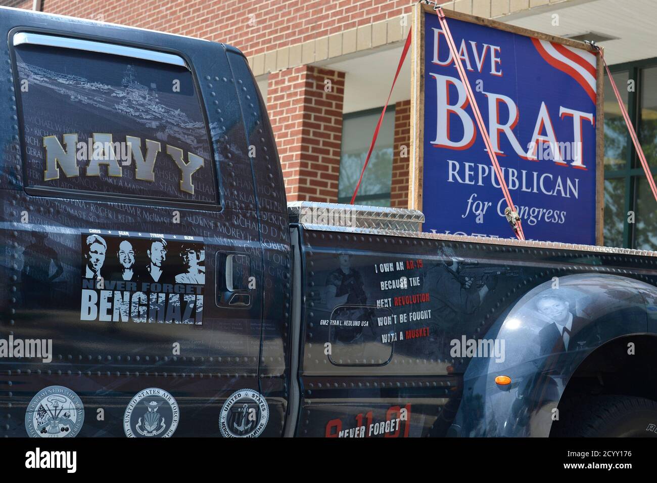 A truck driven by a supporter for Tea Party candidate Dave Brat's campaign is parked in front of his headquarters in Glen Allen, Virginia, June 11, 2014. Brat defeated U.S. House Majority Leader Eric Cantor in a surprise primary upset for the Republican seat in suburban Richmond.   REUTERS/Mike Theiler   (UNITED STATES - Tags: POLITICS ELECTIONS) Stock Photo
