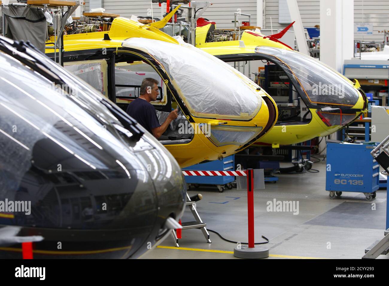 A general view of helicopters being assembled at the Airbus production  facility in Donauwoerth, Southern Germany October 9, 2014. Picture taken  October 9. REUTERS/Michaela Rehle (GERMANY - Tags: TRANSPORT BUSINESS Stock  Photo - Alamy