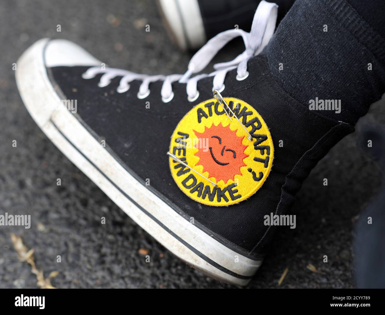 The shoe of an anti-nuclear demonstrator is pictured during a blockade of  the entrance to nuclear power plant Brokdorf, in Brokdorf June 18, 2011.  Friday marked the point of no return for