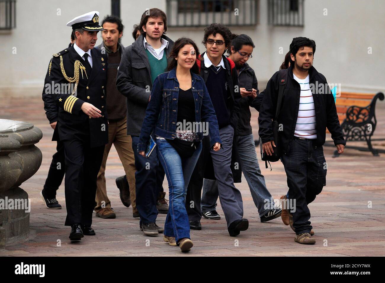Chile S Student Leaders Camila Vallejo Front And Giorgio Jackson Back To Vallejo S L Arrive Accompanied By Their Mates For A Meeting With President Sebastian Pinera To Attend A Negotiation Between The Government