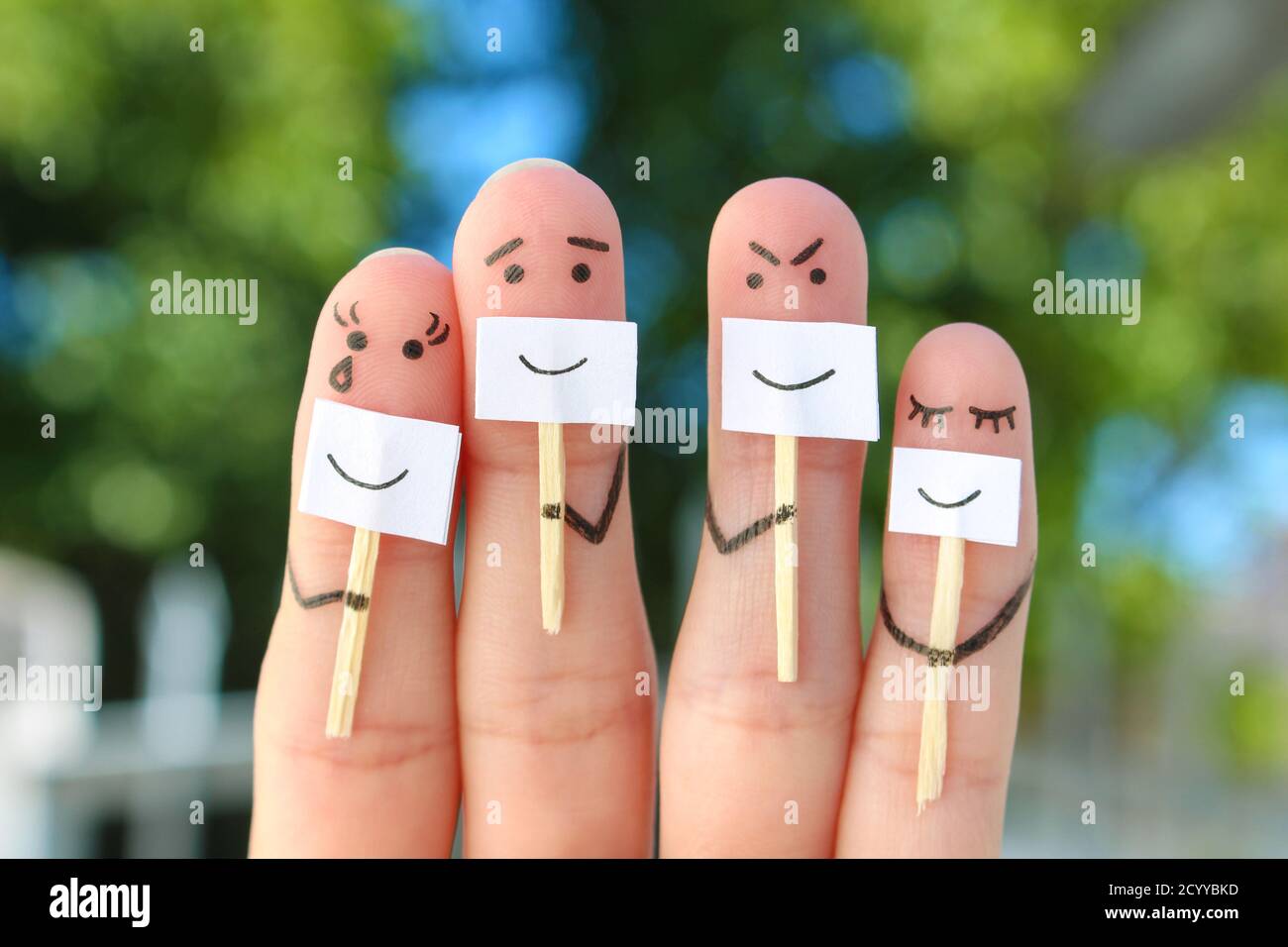 Fingers art of family. Concept of people hiding emotions. Stock Photo