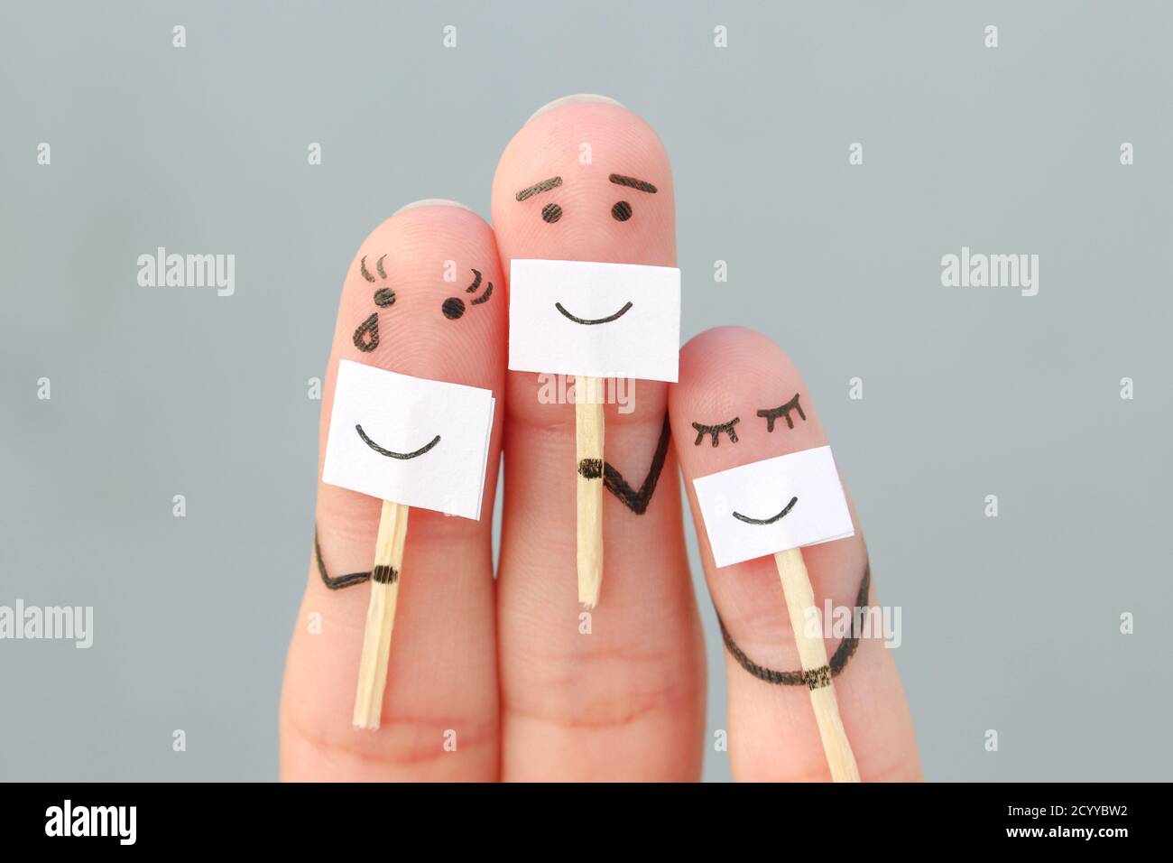 Fingers art of family. Concept of people hiding emotions. Stock Photo