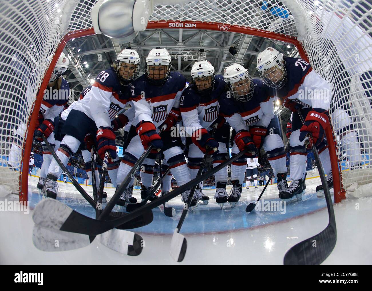 Team Usa Women S Ice Hockey Players Gather By The Net Before Their Game Against Canada At