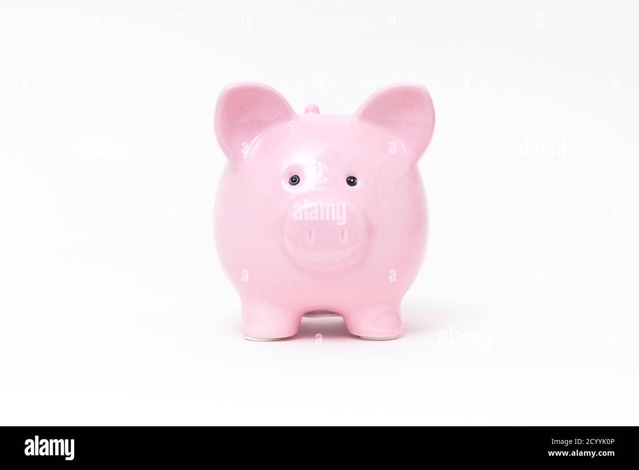 Piggy bank on white background. Savings and budget concept Stock Photo ...