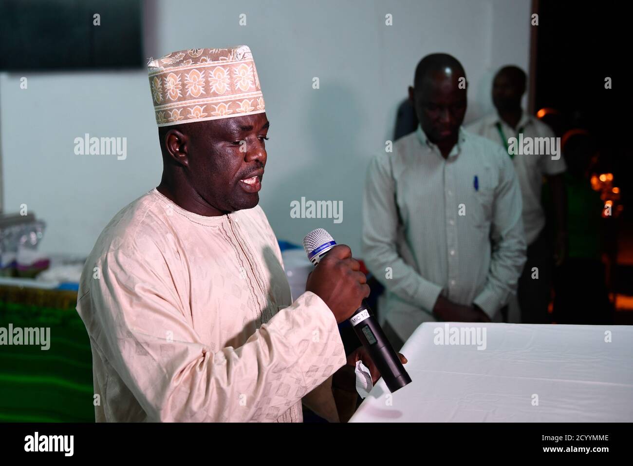 AMISOM Police Imam, DSP Abubakar Ringim leads a prayer at a dinner hosted for AMISOM Muslim personnel to mark Eid ul Adha in Mogadishu, Somalia on August 11, 2019.  Eidul Adha is an important religious holiday celebrated by Muslims all around the world. Stock Photo