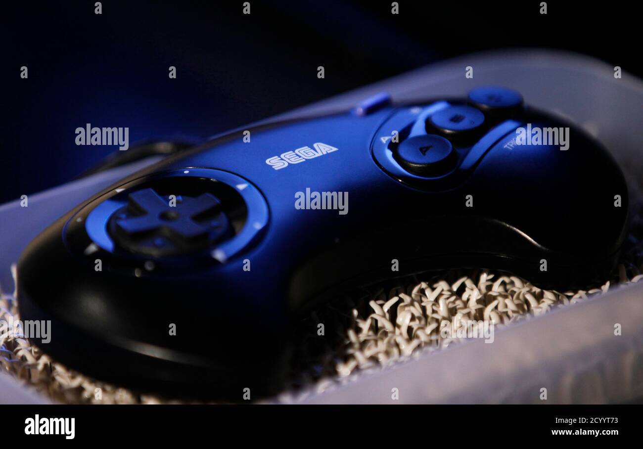 The Sega Corp. logo is seen on a control unit of a video game console at a video  game arcade in Tokyo June 20, 2011. Japanese video game developer Sega Corp  said