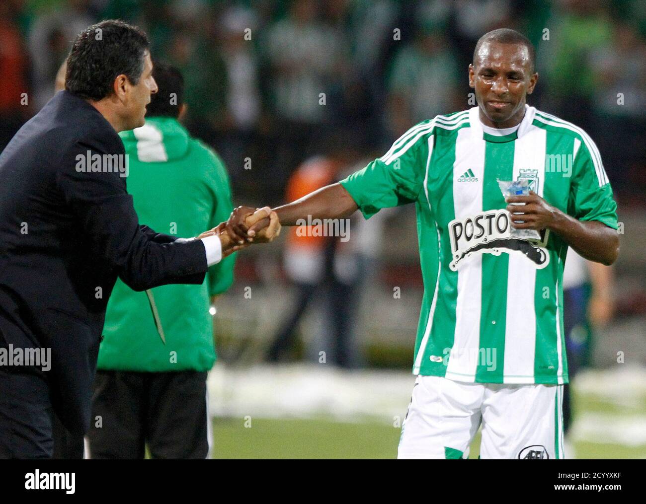 Juan Valencia R Of Colombia S Atletico Nacional Celebrates With His Coach Santiago Escobar After Scoring Against University Of Chile During Their Copa Libertadores Soccer Match In Medellin February 14 2012 Reuters Albeiro Lopera