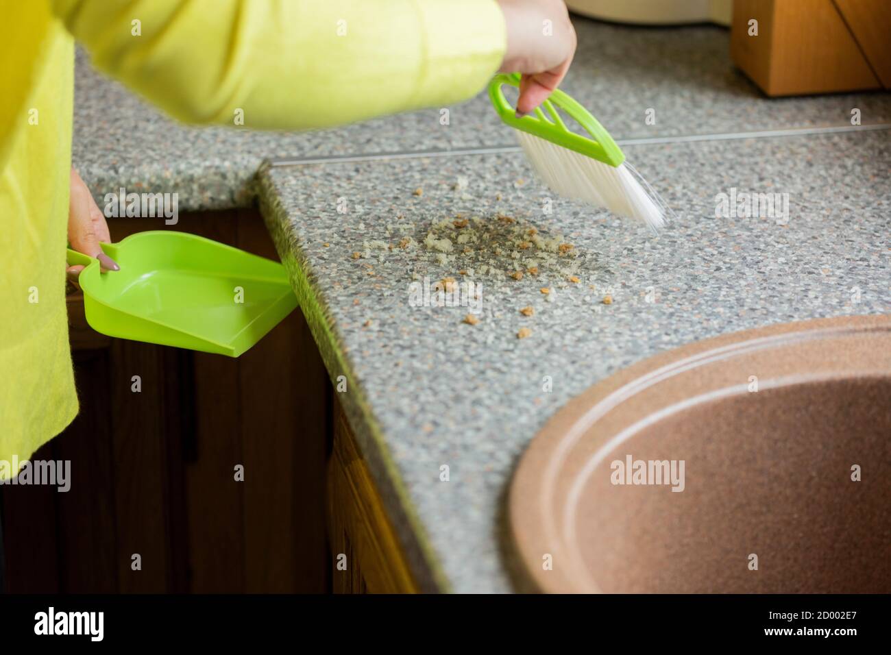 Sweeps the crumbs hires stock photography and images Alamy