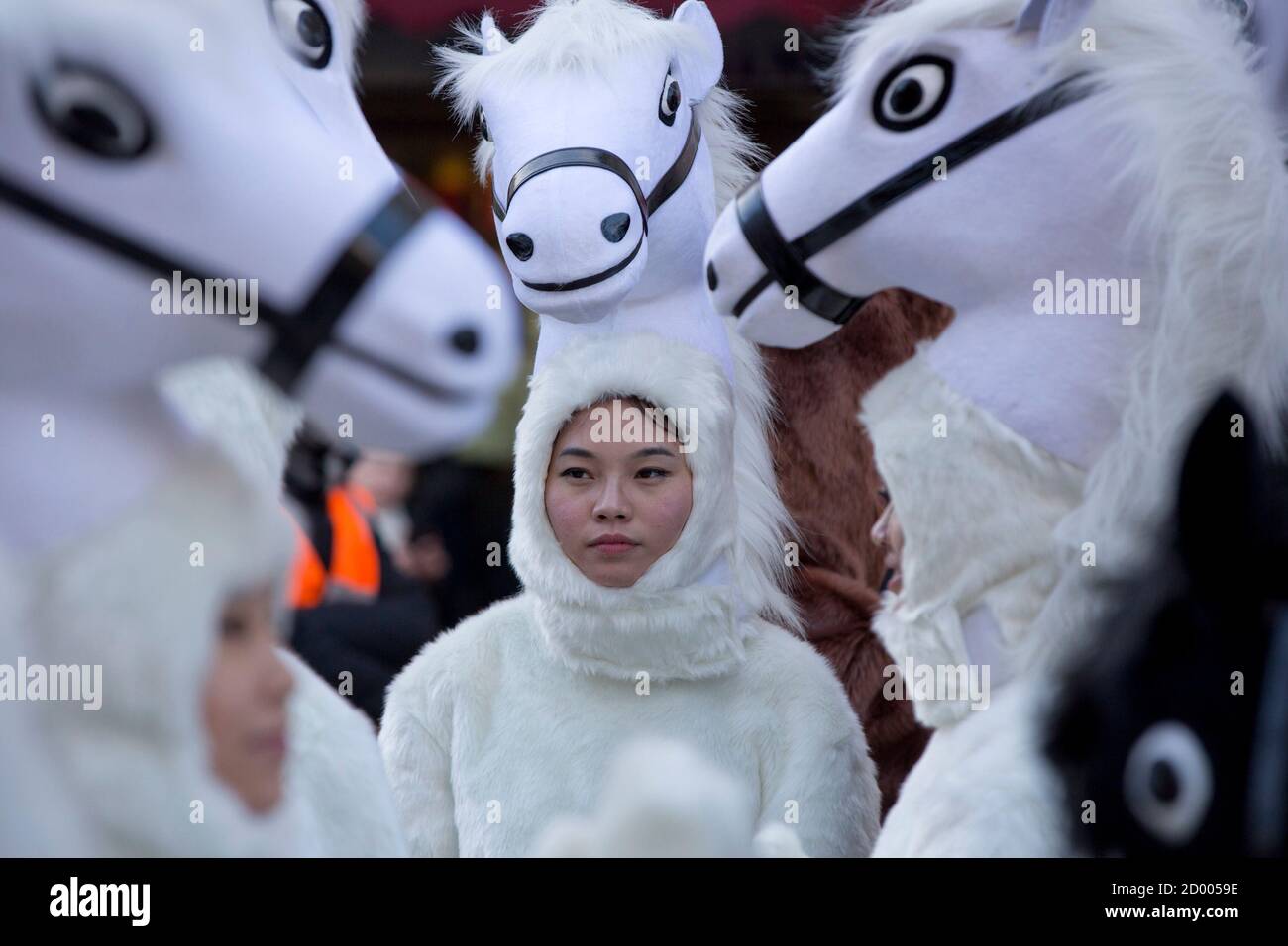 Revellers dressed in costumes prepare for a parade celebrating Chinese New Year, the Year of the Horse, in central London Feburary 2, 2014.   REUTERS/Neil Hall (BRITAIN - Tags: ANNIVERSARY ENTERTAINMENT SOCIETY TPX IMAGES OF THE DAY) Stock Photo