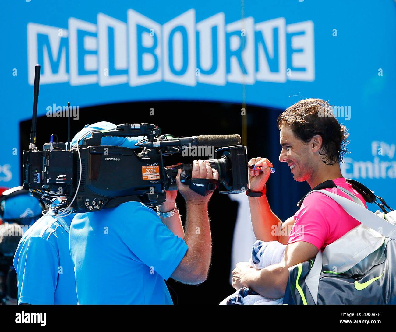 Urskive inden for obligat Rafael Nadal of Spain signs on the lens of a television camera after  defeating Mikhail Youzhny of Russia in their men's singles first round  match at the Australian Open 2015 tennis tournament