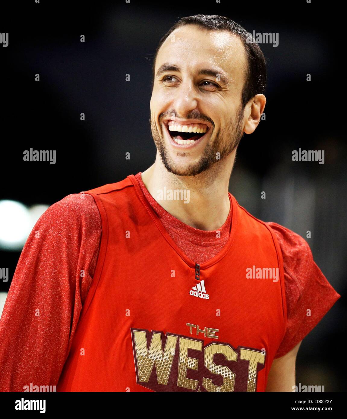 West Team's Manu Ginobili, who is on the San Antonio Spurs NBA team, laughs  during practice for the NBA All-Star game in Los Angeles, California,  February 19, 2011. REUTERS/Lucy Nicholson (UNITED STATES -