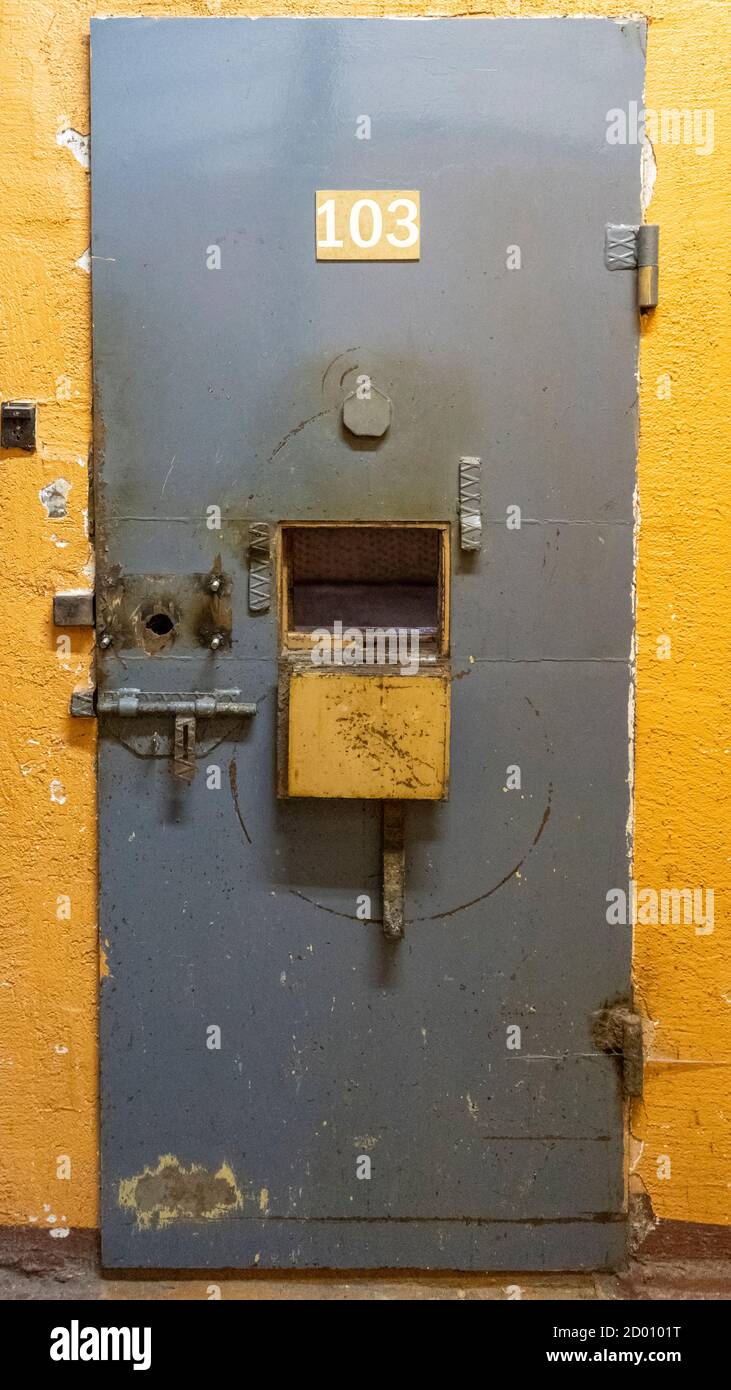 Prison's windows of metal door protect prisoner from inside to escape. Food channel through