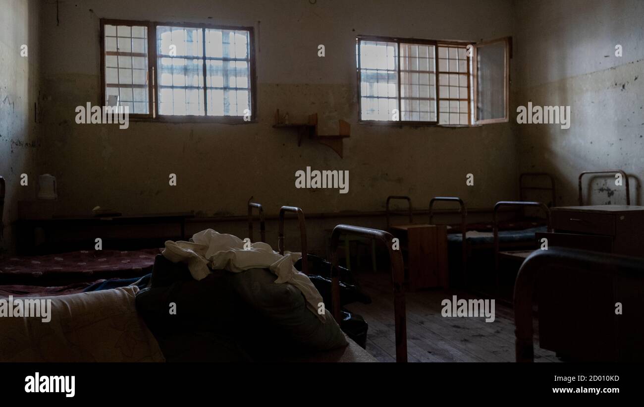 Light Coming in Through Prison Cell Bars Window. Jail Cells. Prison