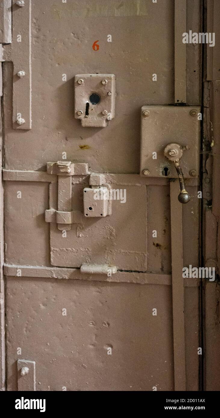 Prison's Windows of Metal Door Protect Prisoner From Inside to Escape. Food Channel Through