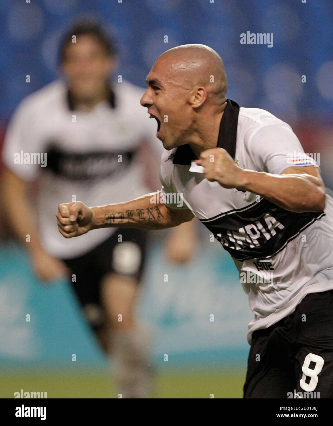 Vladimir Marin Of Paraguay S Olimpia Celebrates After Scoring Against Brazil S Flamengo During Their Copa Libertadores Soccer Match In Rio De Janeiro March 15 2012 Reuters Ricardo Moraes Brazil Tags Sport Soccer Stock Photo