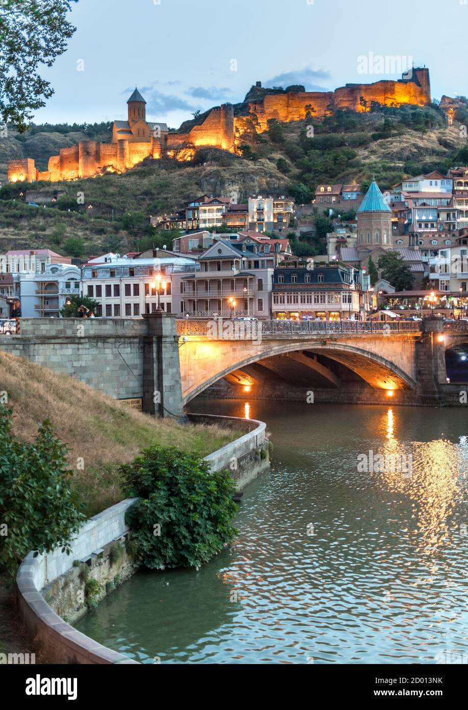 Dusk view of Narikala fortress, the Mtkvari River and the old town in Tbilisi, the capital of Georgia. Stock Photo