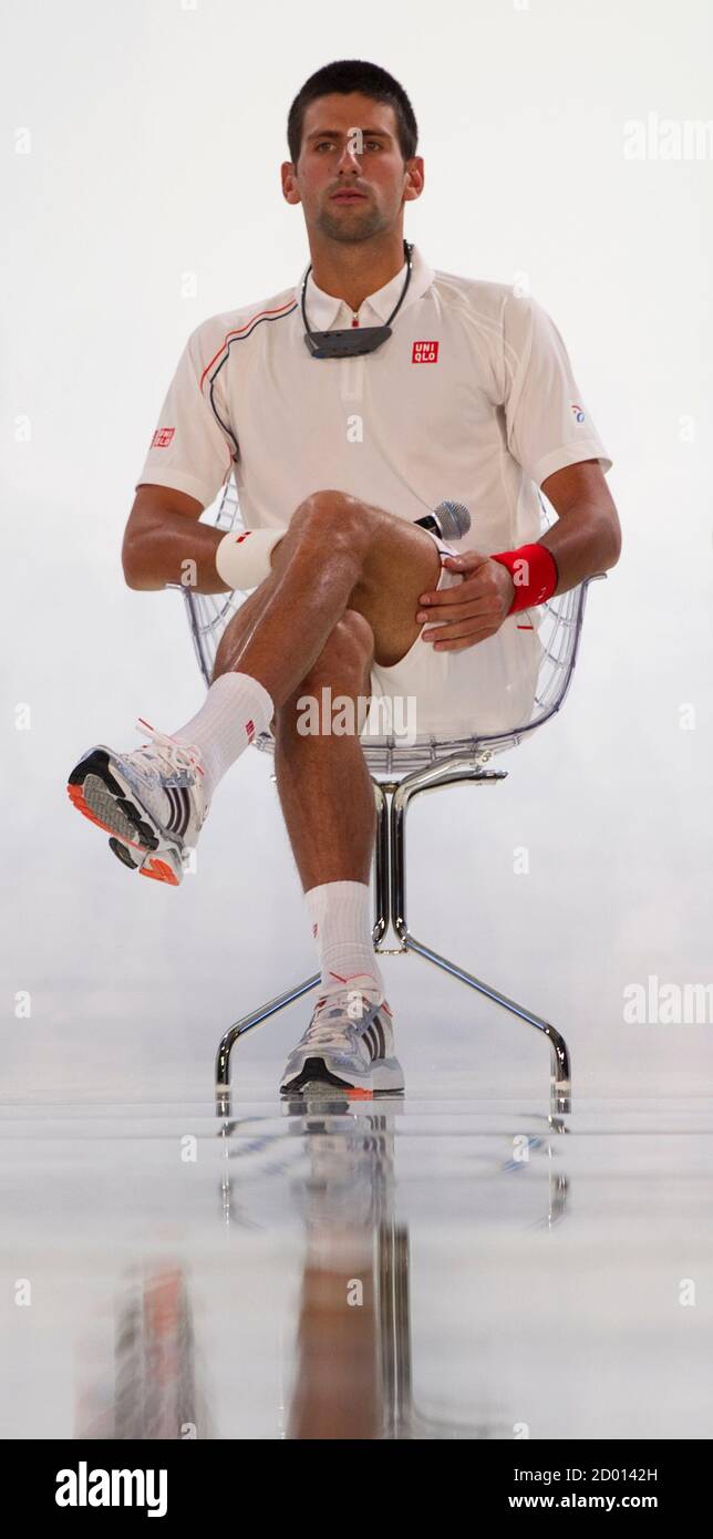 Tennis player Novak Djokovic of Serbia attends the presentation of his new  sponsorship deal with Uniqlo budget fashion chain in Paris May 23, 2012.  Djokovic, appointed Uniqlo global brand ambassador, is the