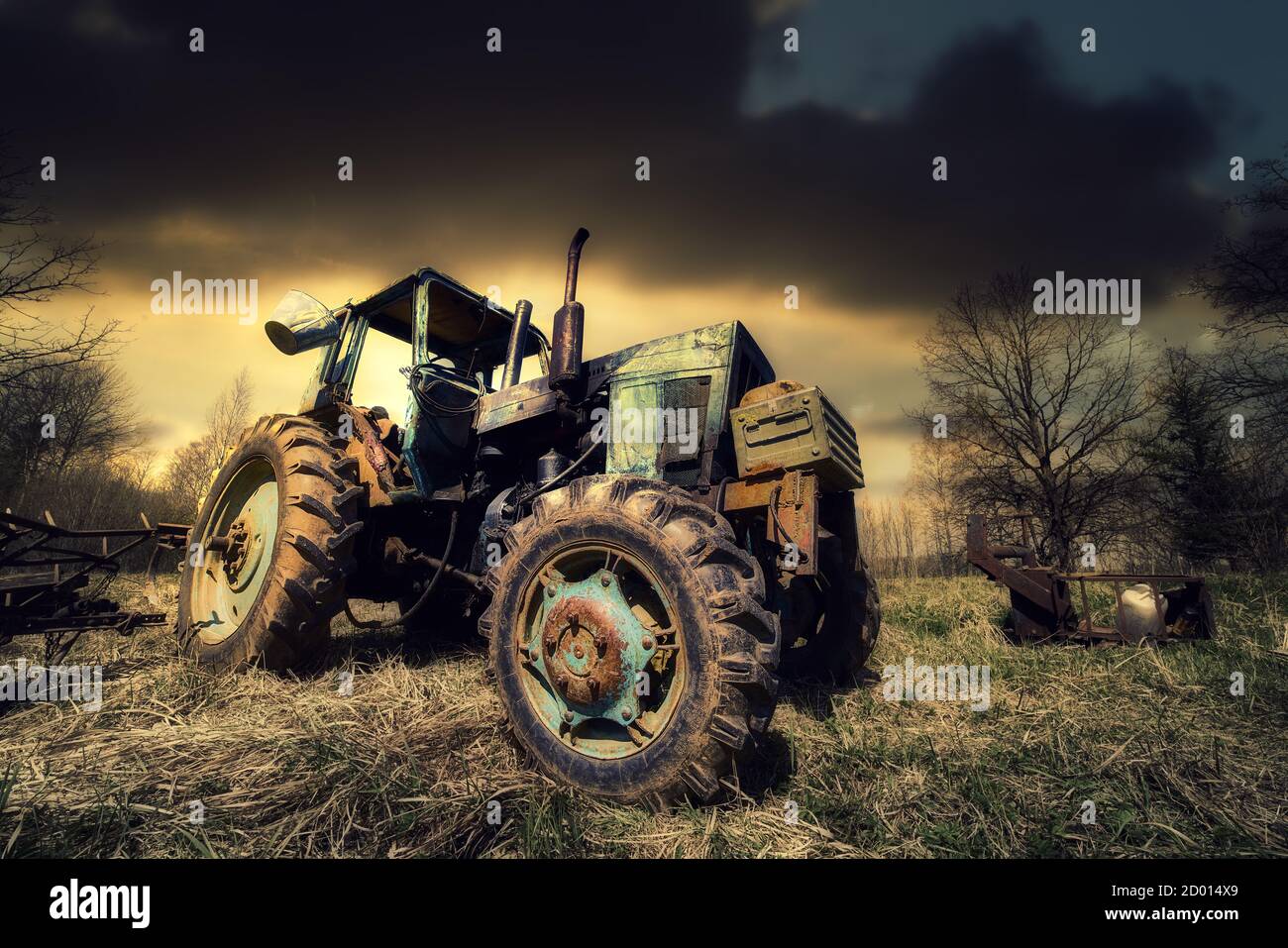 old tractor on the grass field Stock Photo - Alamy