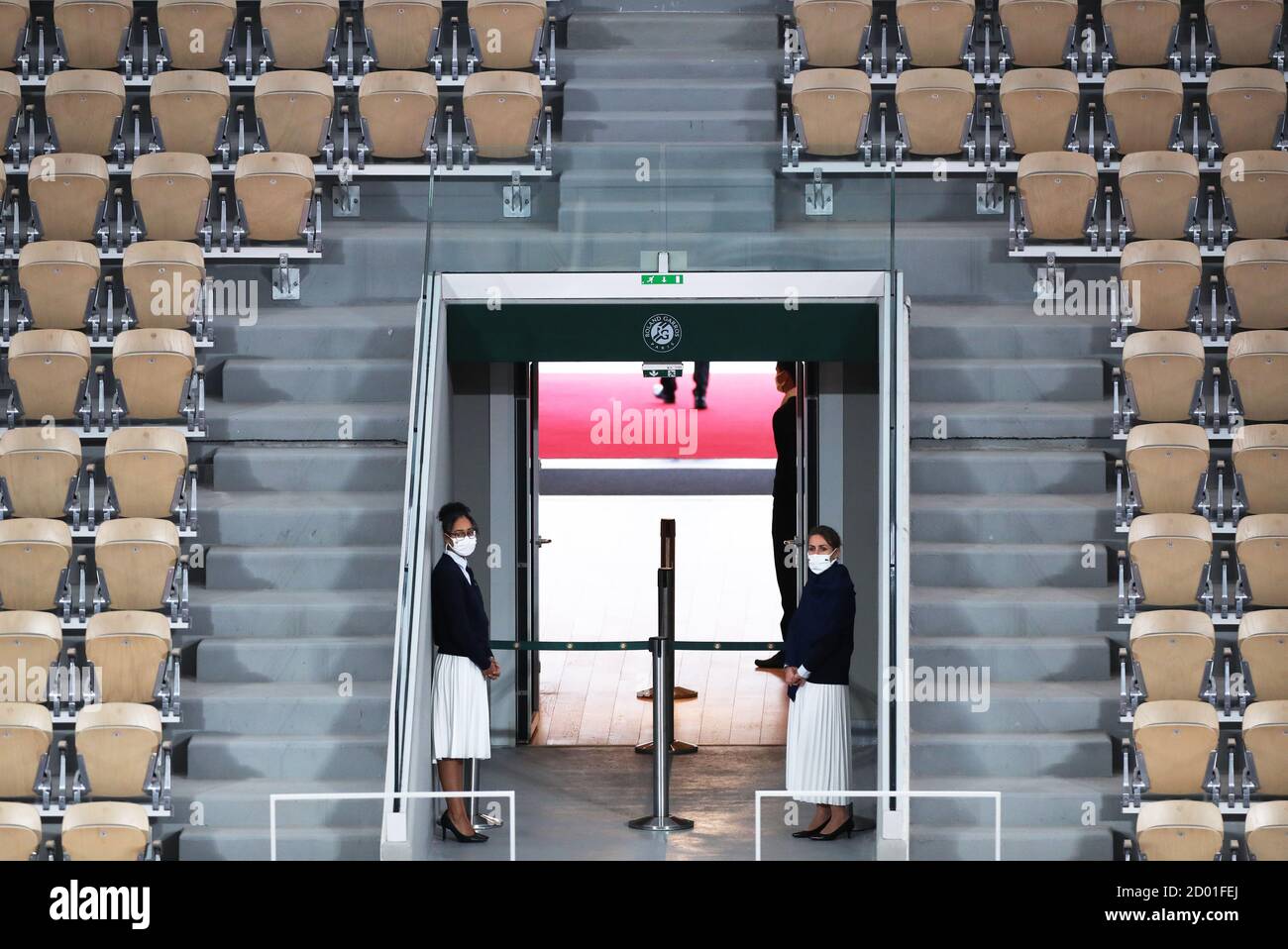Paris, Paris, France. 2nd Oct, 2020. Staff members are seen during the men's singles third round match between Casper Ruud of Norway and Dominic Thiem of Austria at French Open tennis tournament 2020 at Roland Garros, in Paris, France on Oct. 2, 2020. Credit: Gao Jing/Xinhua/Alamy Live News Stock Photo