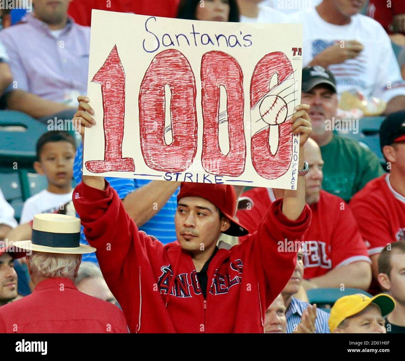 A fan celebrates Los Angeles Angels' Ervin Santana's 1000th career strikeout during their MLB American League baseball game against the Texas Rangers in Anaheim, California August 17, 2011. REUTERS/Lucy Nicholson (UNITED STATES - Tags: SPORT BASEBALL) Stock Photo