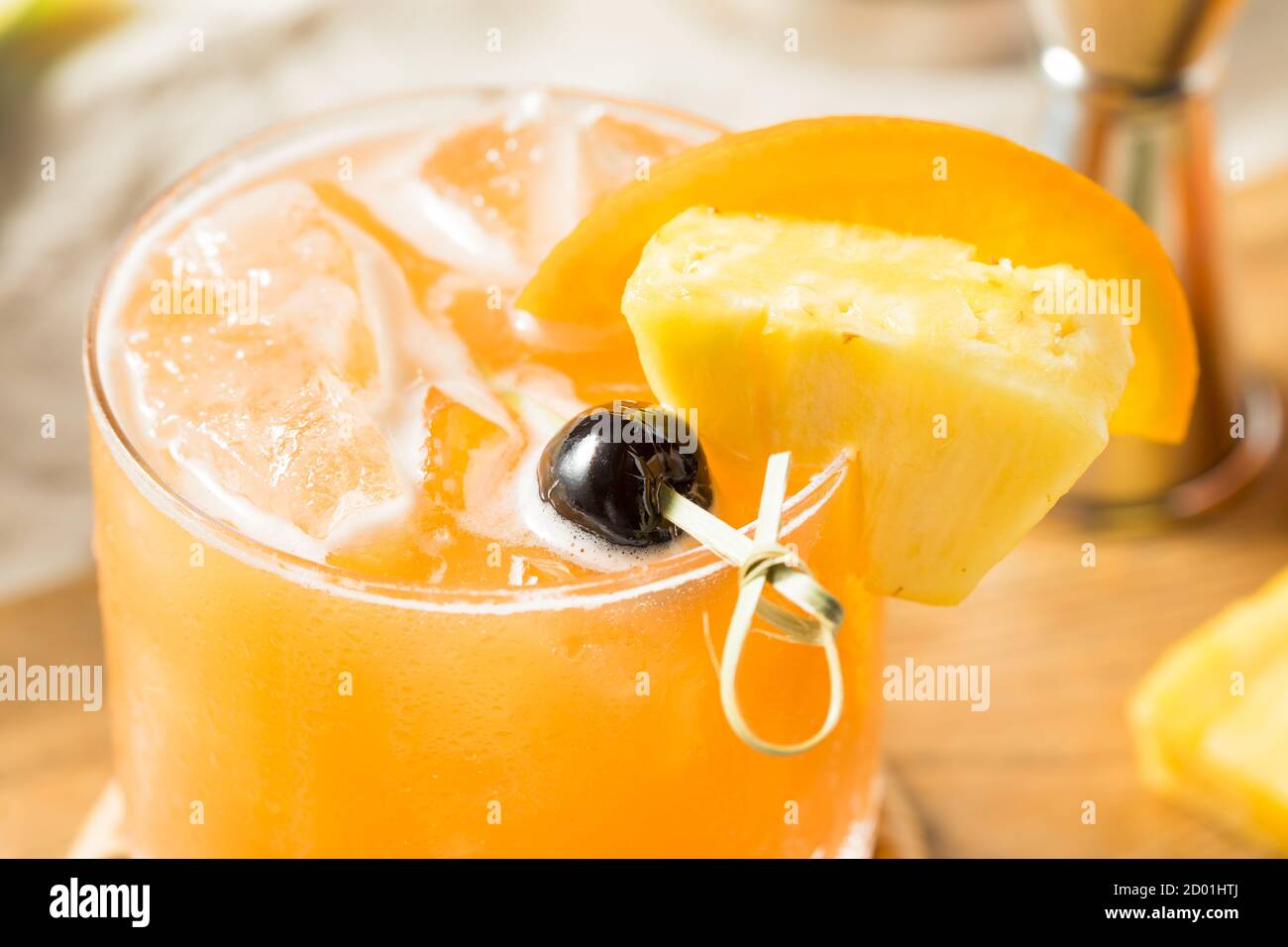 Refreshing Boozy Rum Runner Cocktail with PIneapple and Orange Stock Photo