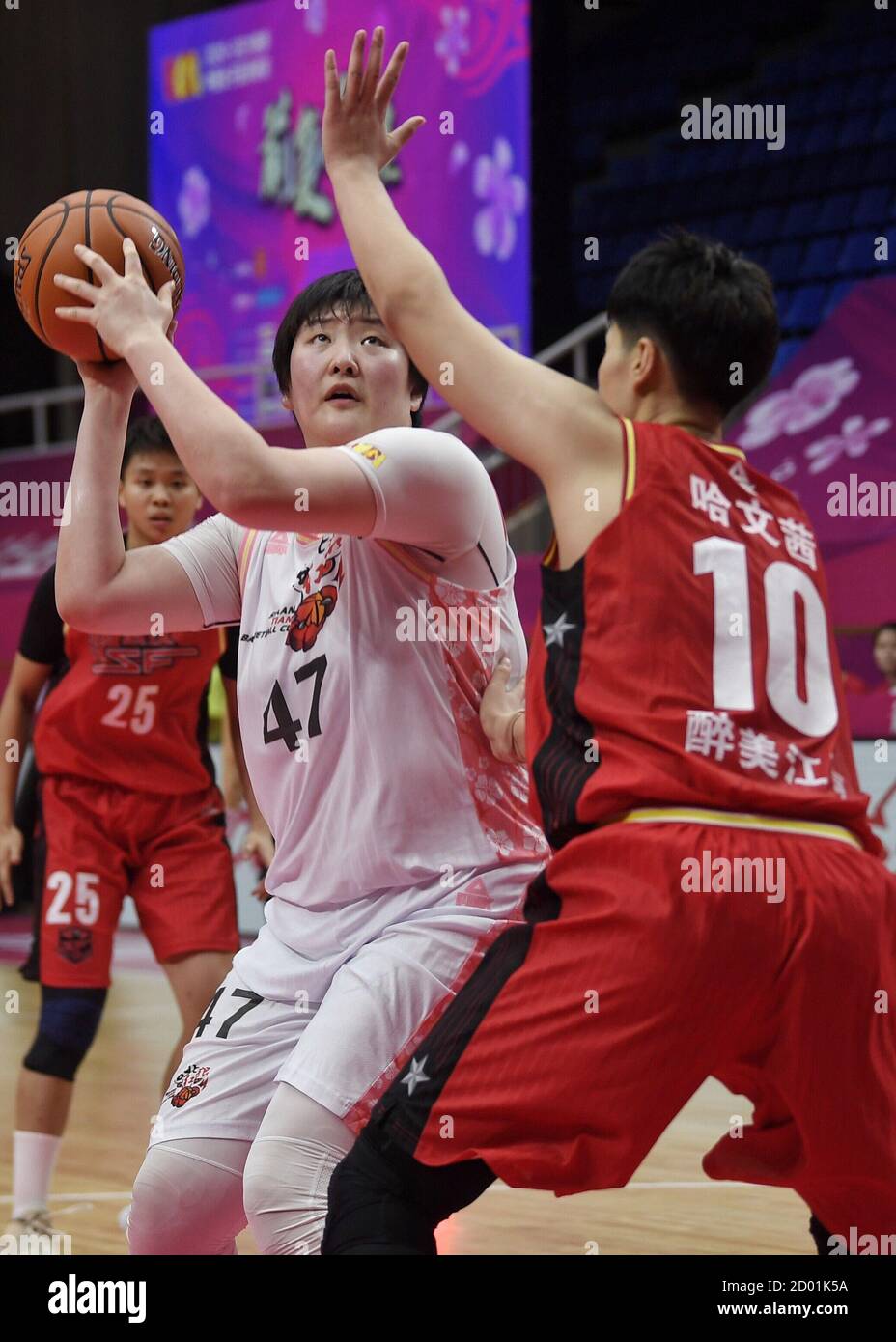 Chengdu, China's Sichuan Province. 2nd Oct, 2020. Ma Jiaying (L) of Shaanxi competes during 1st round match between Shaanxi and Wuhan SF at the 2020-21 Women's Chinese Basketball Association (WCBA) league in Chengdu, capital of southwest China's Sichuan Province, Oct. 2, 2020. Credit: Liu Kun/Xinhua/Alamy Live News Stock Photo