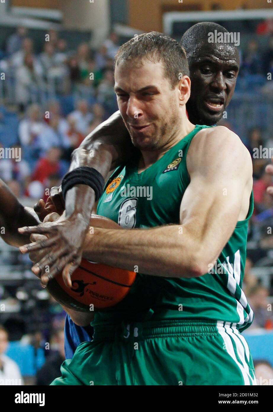 Boniface Ndong (R) of Barcelona Regal struggles for the ball with Aleks  Maric of Panathinaikos during their Euroleague basketball Final Four bronze  medal game in Istanbul May 13, 2012. REUTERS/Murad Sezer (TURKEY -