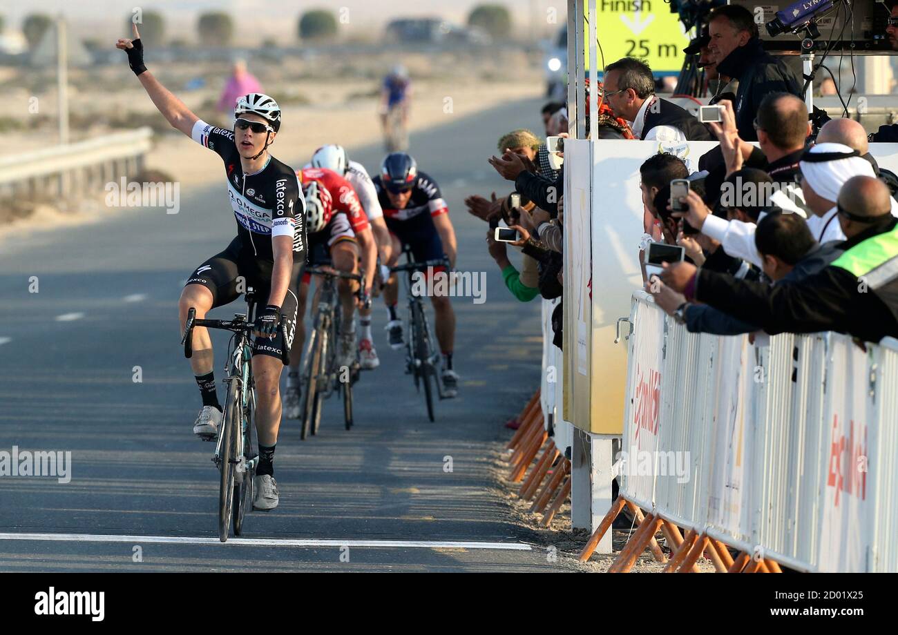 Omega Pharma-Quick Step team rider Niki Terpstra of the Netherlands wins  stage one of the Tour of Qatar from Al Wakra to Dukhan Beach in Doha  February 9, 2014. REUTERS/Fadi Al-Assaad (QATAR -