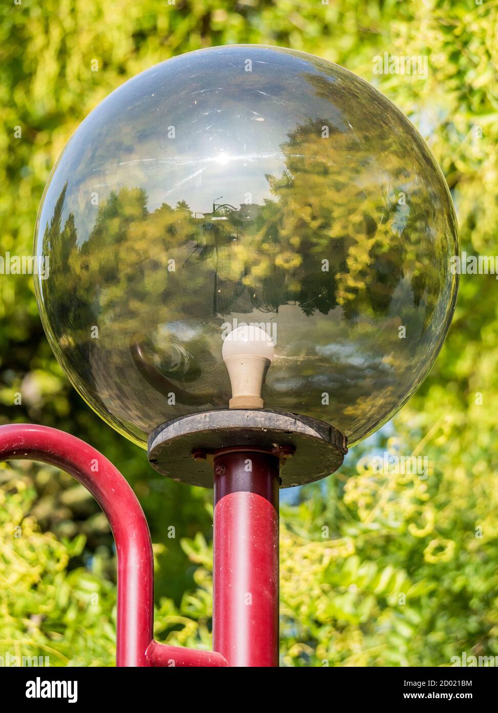 Street light globe with a light bulb inside Stock Photo Alamy