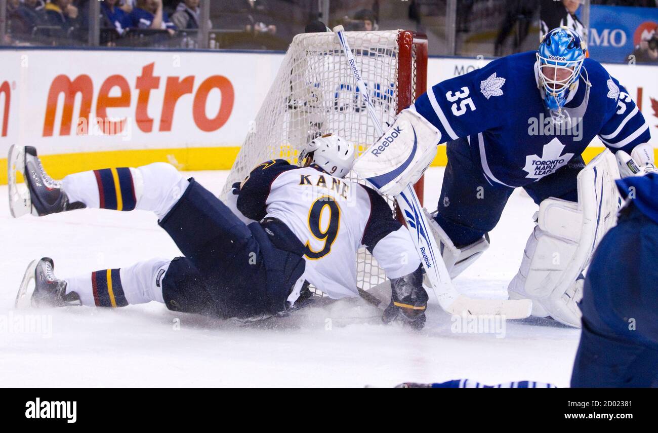 Atlanta Thrashers Evander Kane Slides By Toronto Maple Leafs Goalie Jean Sebastien Giguere After Being Tripped