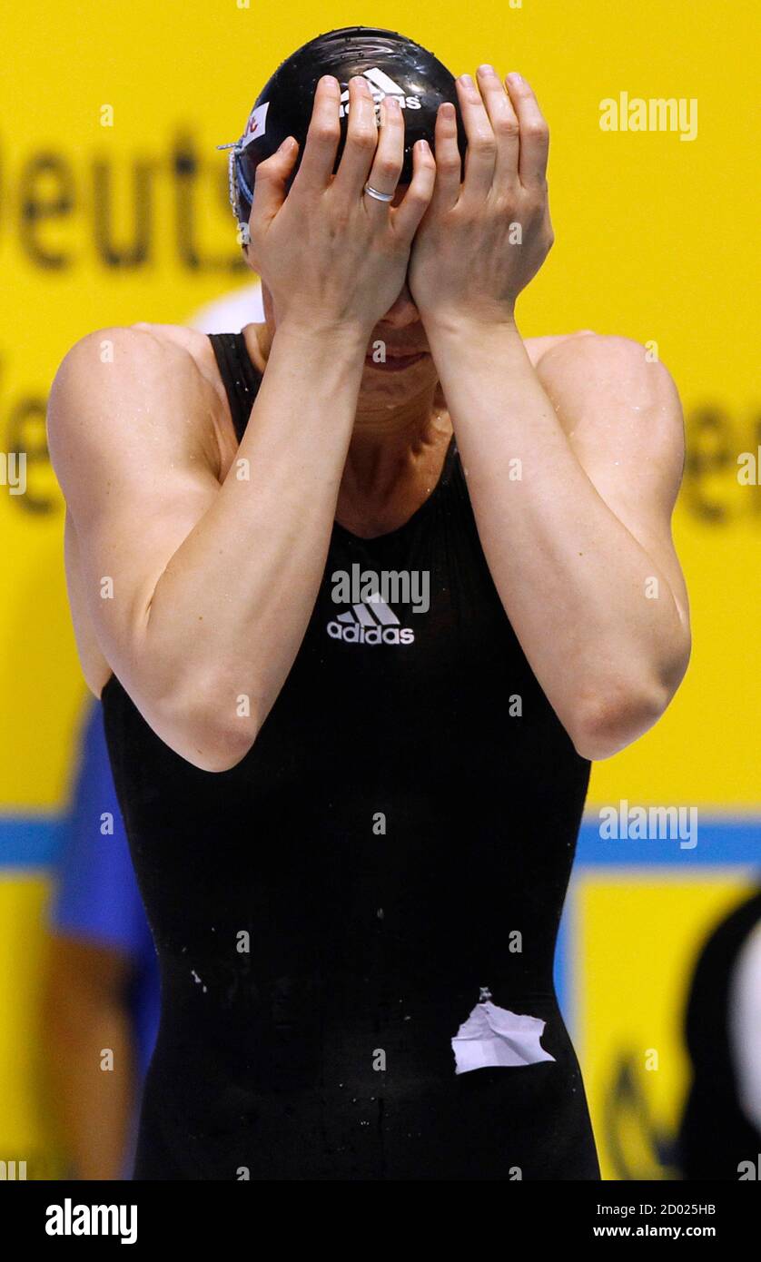 Britta Steffen of Germany prepares to start in the women's 50m freestyle  event at the Short Course Swimming World Cup in Berlin October 22, 2011.  Therese Alshammar of Sweden won the competition