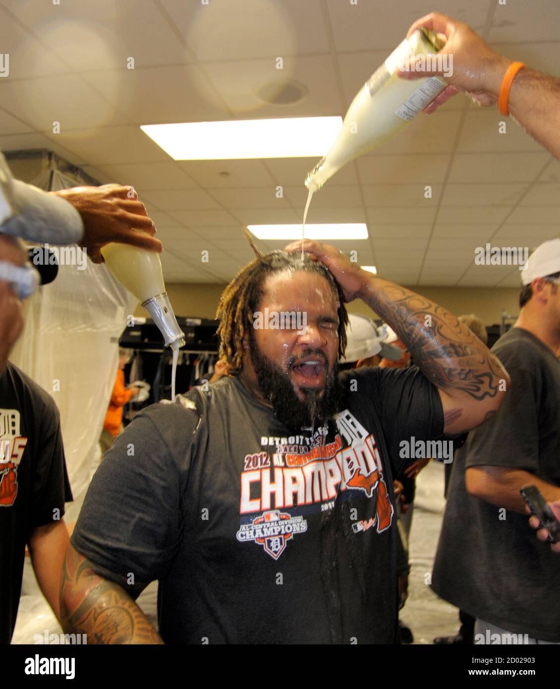 Detroit Tigers first baseman Prince Fielder is dowsed in champagne during a  locker room celebration after clinching the MLB American League Central  Division by beating the Kansas City Royals in a baseball