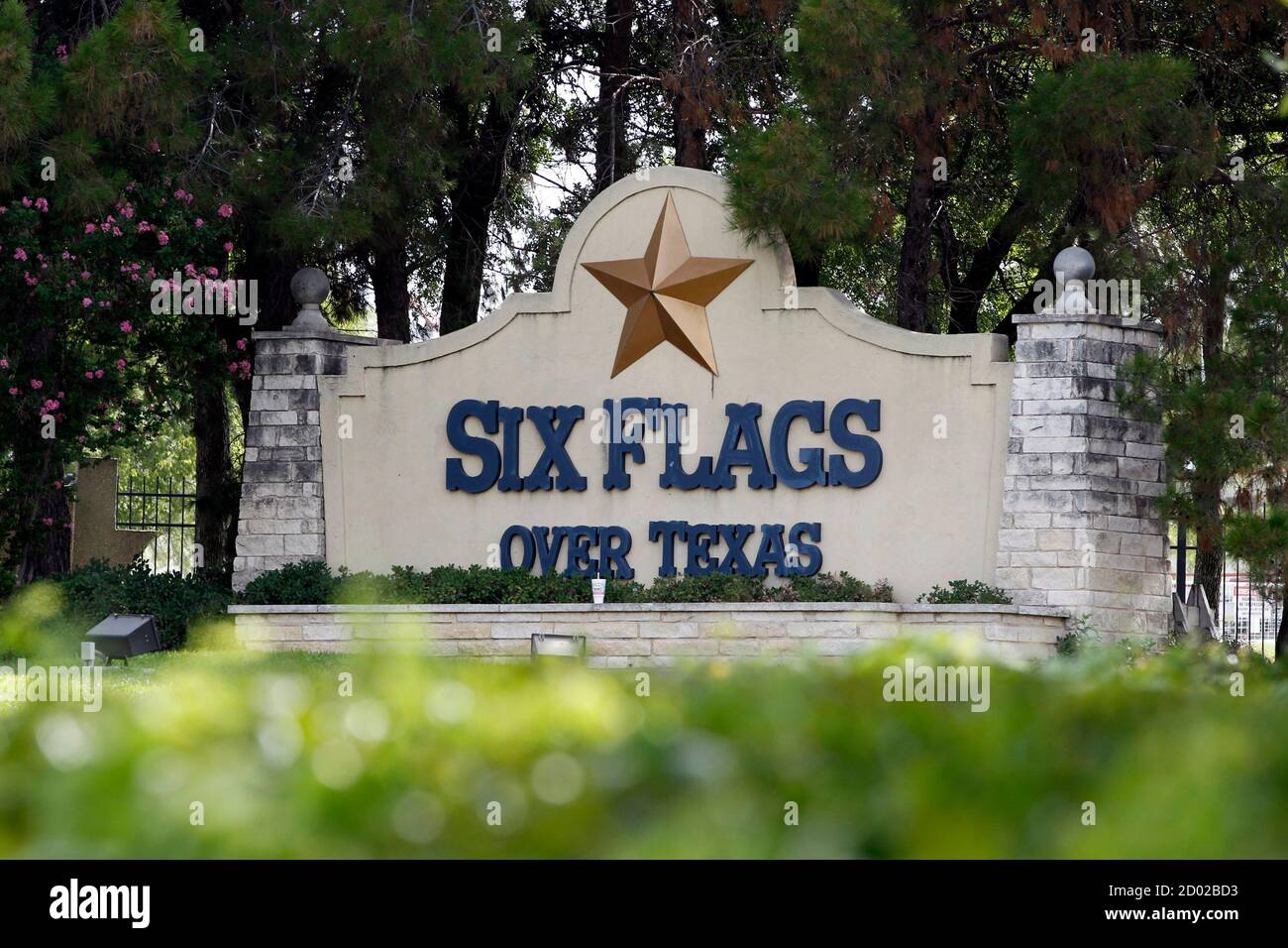 A sign at the entrance of the Six Flags Over Texas amusement park is seen in Arlington, Texas July 23, 2013. A woman who plunged from the Texas Giant roller coaster ride at the Six Flags Over Texas amusement park died of multiple traumatic injuries in a fall that was ruled an accident, authorities said on Monday. REUTERS/Mike Stone (UNITED STATES - Tags: SOCIETY) Stock Photo