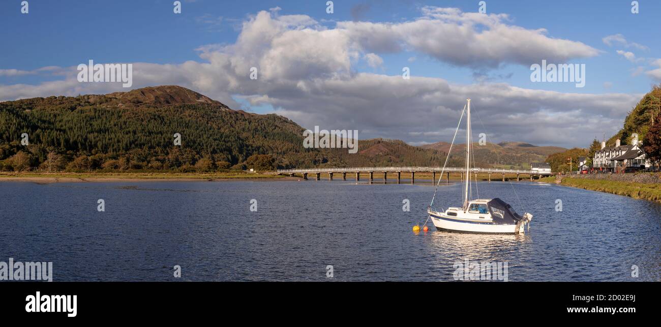 Panoramic view of old wooden toll bridge at Penmaenpool, North Wales Stock Photo