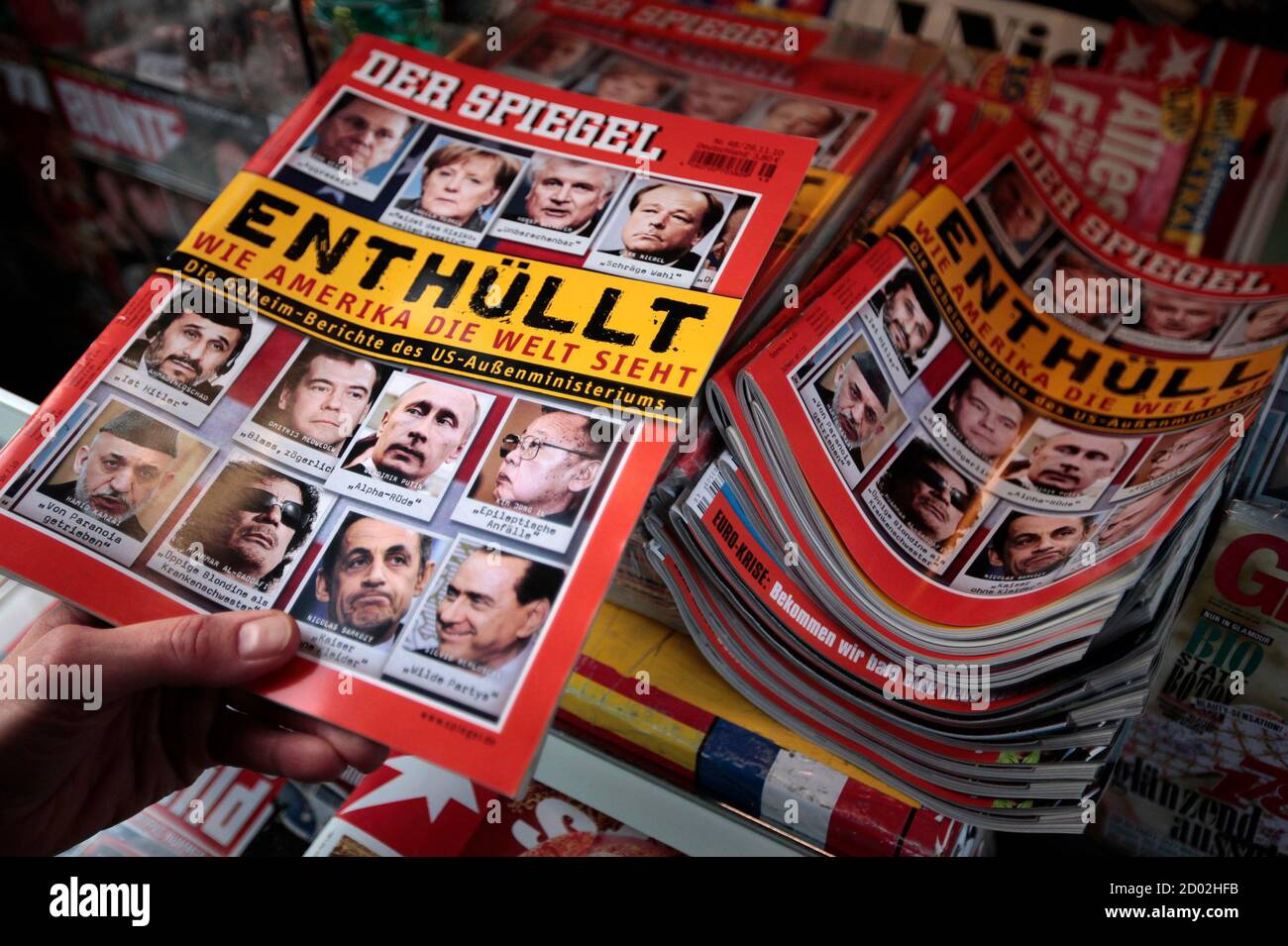 A customer buys the 'Der Spiegel' magazine at a kiosk in Hamburg November  29, 2010. Information taken from secret documents supplied by the WikiLeaks  website are published in the French newspaper Le