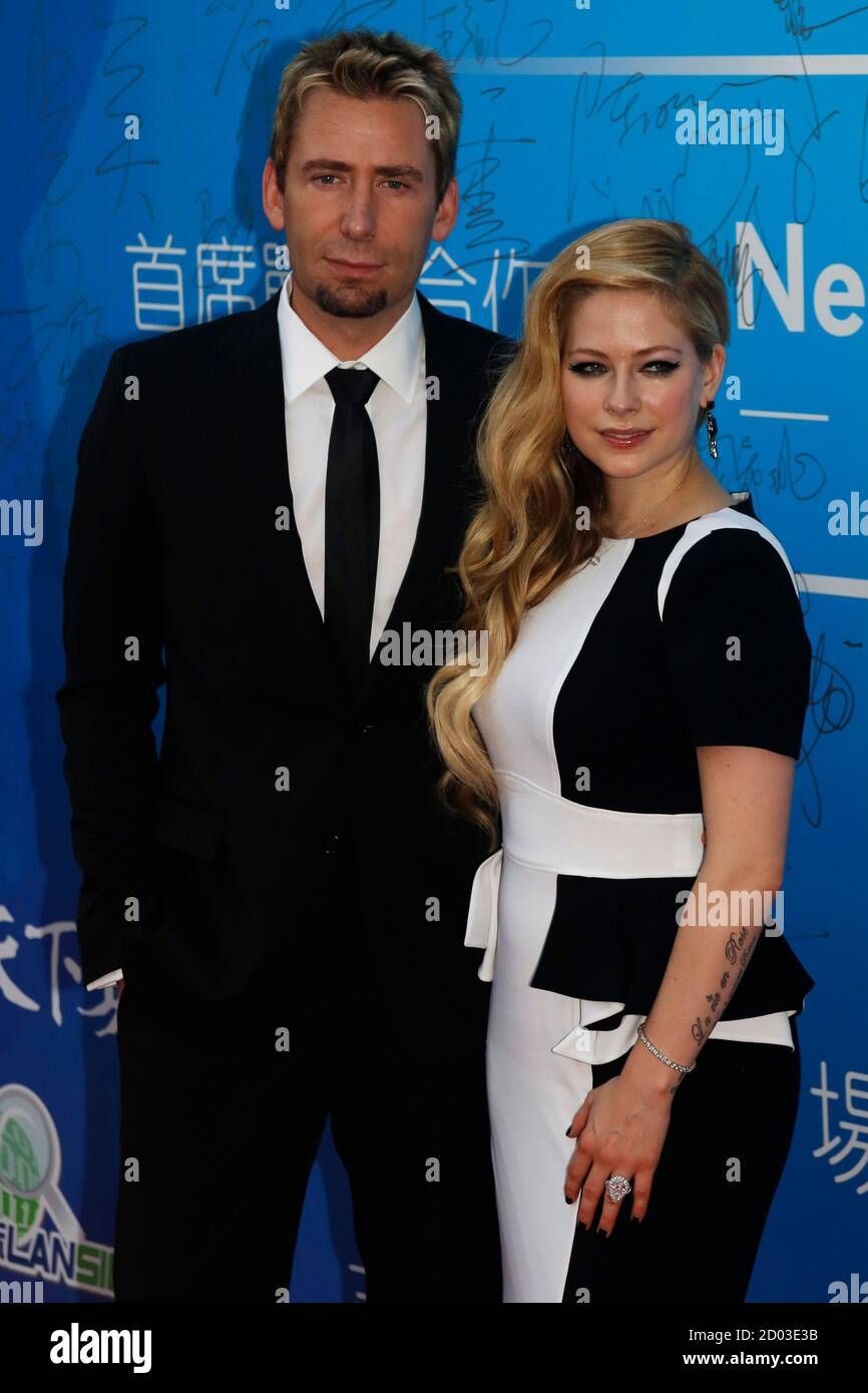 Canadian singer and songwriter Avril Lavigne and her husband Chad