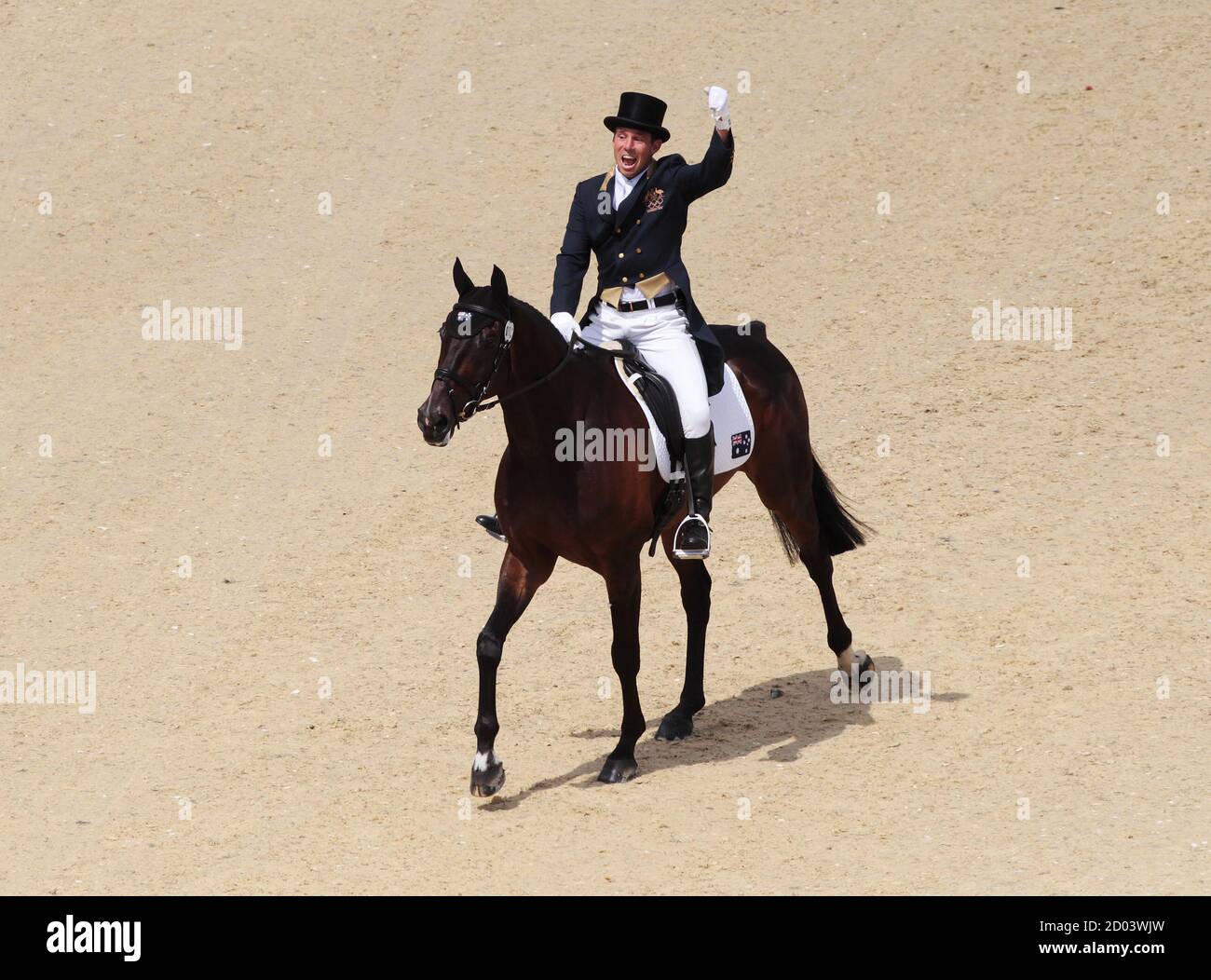 New Zealand rider Sam Griffiths with his horse Happy Times reacts after his score is announced during the Eventing Individual Dressage at the Olympic equestrian arena in Greenwich Park during the London 2012 Olympic Games July 28, 2012. REUTERS/Olivia Harris (BRITAIN - Tags: SPORT OLYMPICS EQUESTRIANISM) Stock Photo