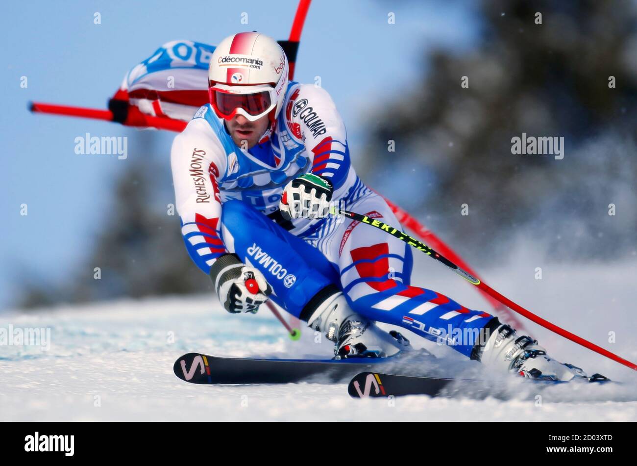 Adrien Theaux of France hits a gate during alpine skiing training for the Men's World Cup downhill in Lake Louise, Alberta November 21, 2012.  REUTERS/Mike Blake  (CANADA - Tags: SPORT SKIING) Stock Photo