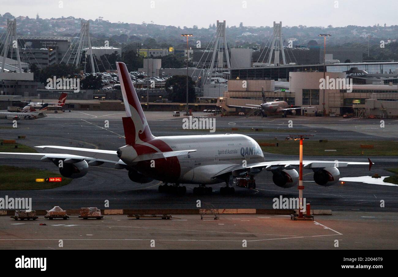 Qantas Airbus A380 Large Four Engined Passenger Aircraft Landing At Sydney Airport While A Jetstar Aircraft Is On The Tarmac Editorial Stock Image Image Of Airport Large 154346519