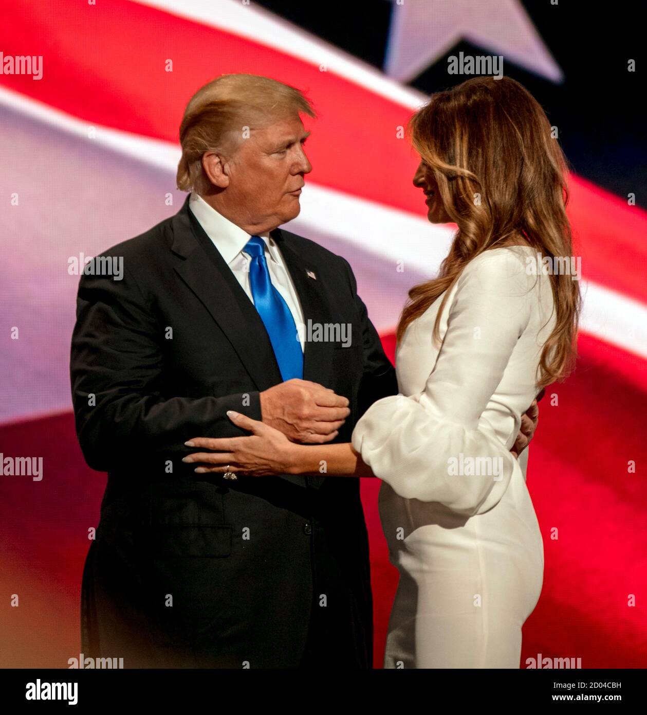 Cleveland Ohio, USA, 18th July, 2016 Future First Lady Melania Trump gets a  hug and kiss from her husband Presidential candidate Donald Trump after she  gave an address to the Republican National