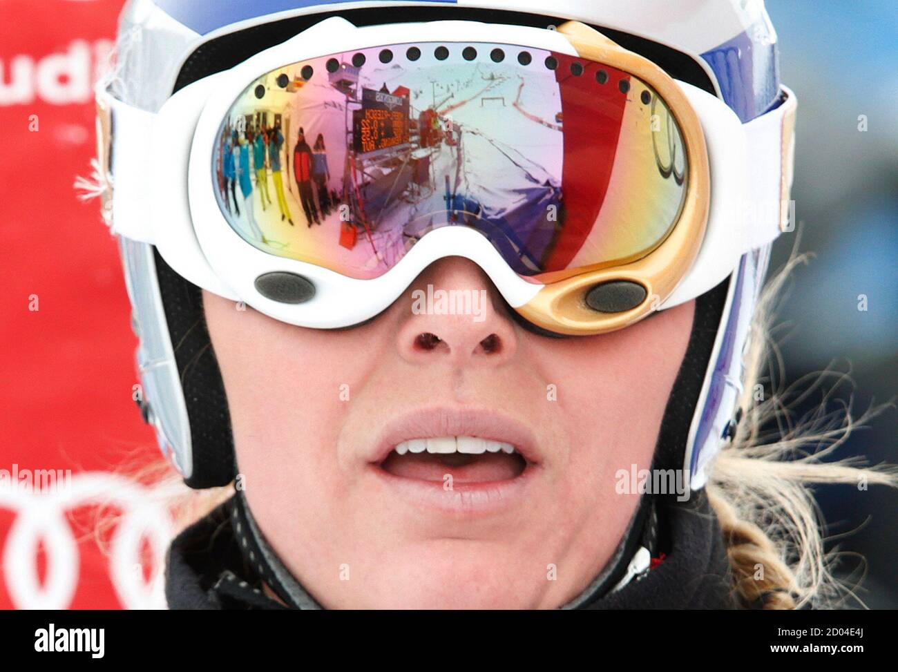 The glasses of Lindsey Vonn of the U.S. mirror the slope in the finish area  after the Super-G run of the women's Alpine skiing World Cup Super Combined  race at the Corviglia