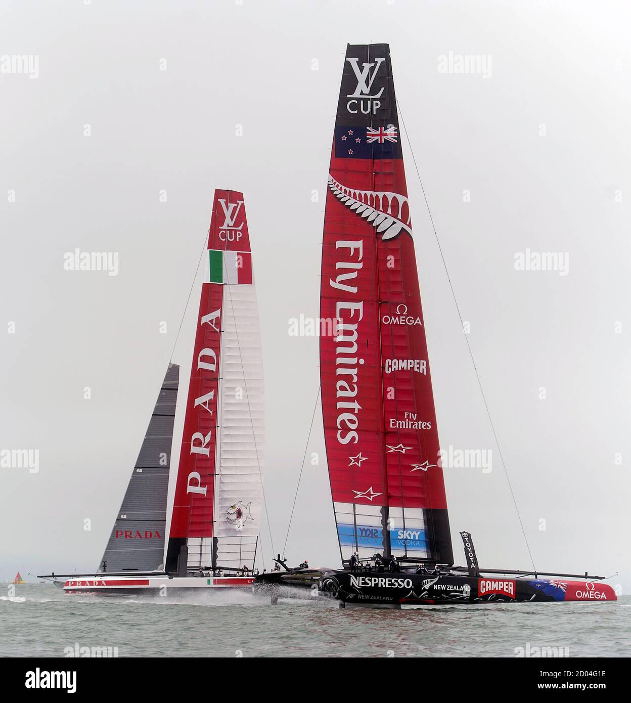 Emirates Team New Zealand (R) leads Italy's Luna Rossa Challenge while  competing in the Louis Vuitton Cup round robin in San Francisco, California  July 21, 2013. Despite having to jettison its jib