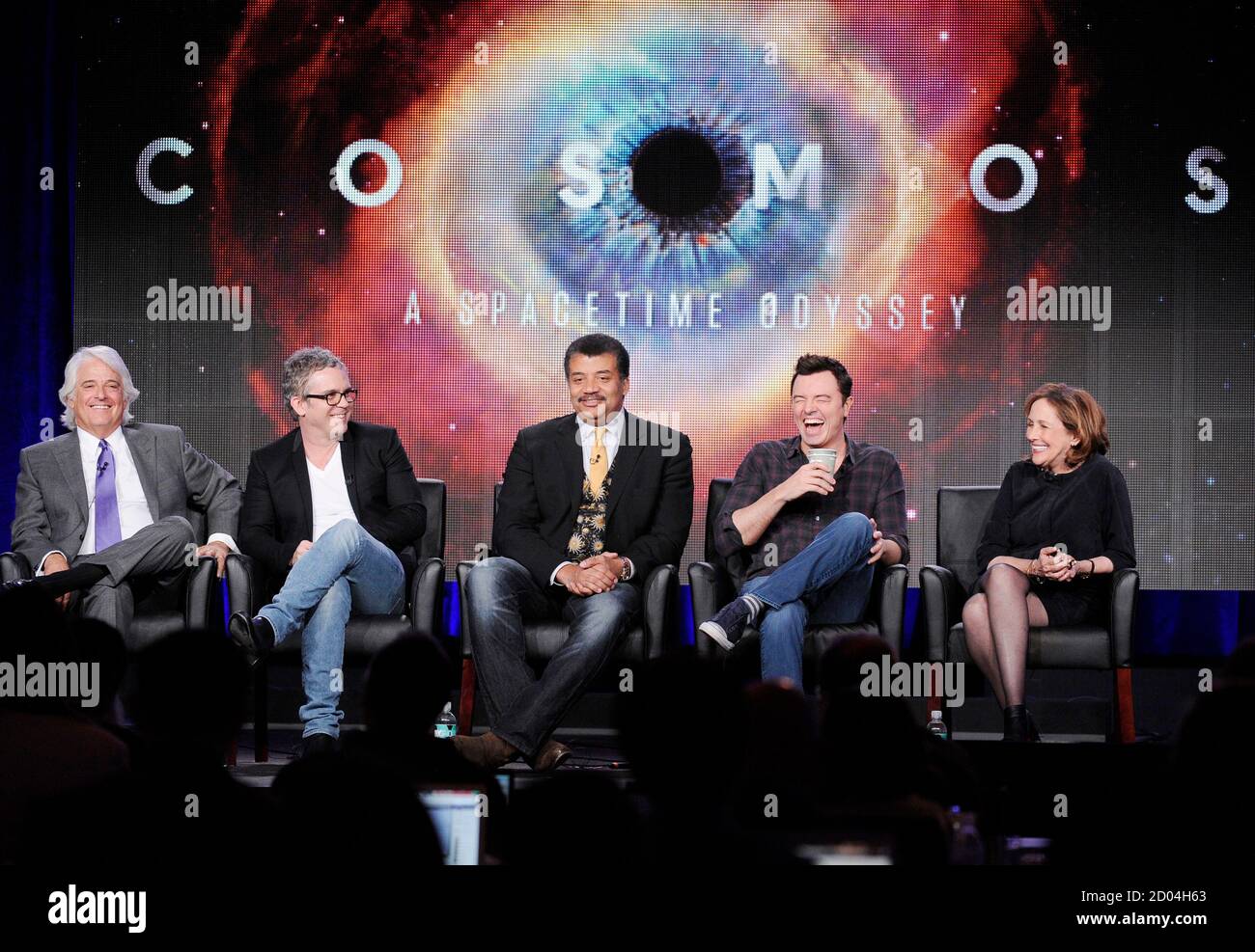 Executive producer Mitchell Cannold (L-R), executive producer and director Brannon Braga, host Neil DeGrasse Tyson, executive producer Seth MacFarlane, executive producer and writer Ann Druyan of the new show 'Cosmos' participate in Fox Broadcasting Company's part of the Television Critics Association (TCA) Winter 2014 presentations in Pasadena, California, January 13 , 2014. REUTERS/Kevork Djansezian  (UNITED STATES - Tags: ENTERTAINMENT) Stock Photo