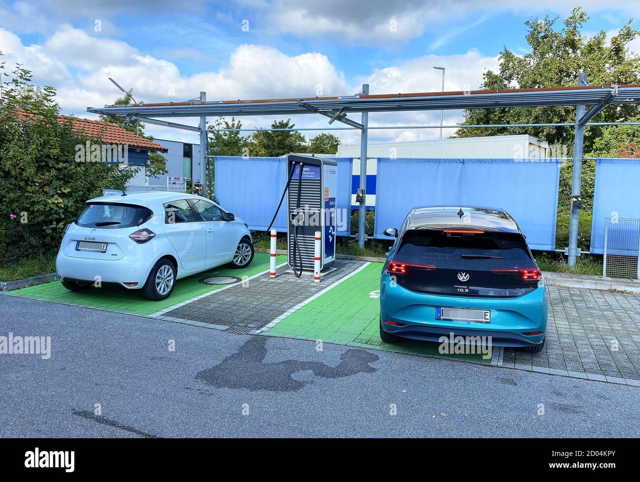 Ebersberg, Germany, September 30, 2020. New Volkswagen ID electric car and a Renault Zoe at a EnBW power station © Peter Schatz / Alamy Live News Stock Photo