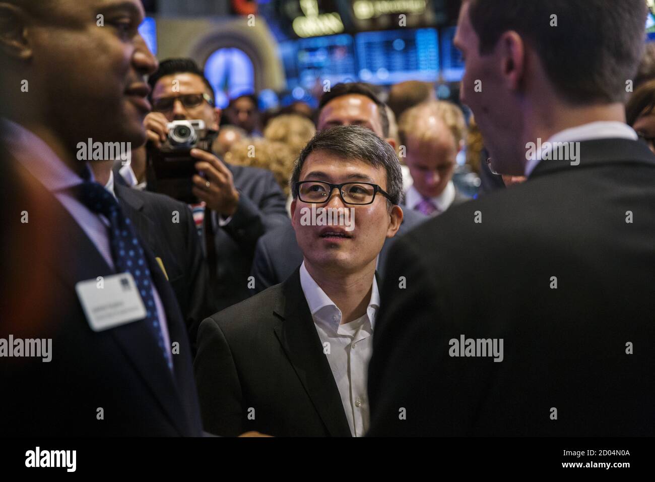 James Park, Fitbit CEO, walks across the floor as he arrives for the  company's IPO on the floor of the New York Stock Exchange, June 18, 2015.  Shares of Fitbit Inc, the