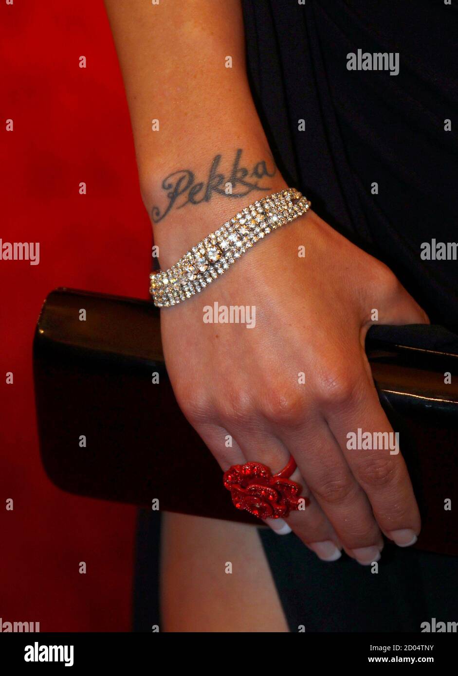 Red carpet hand tattoo hi-res stock photography and images - Alamy