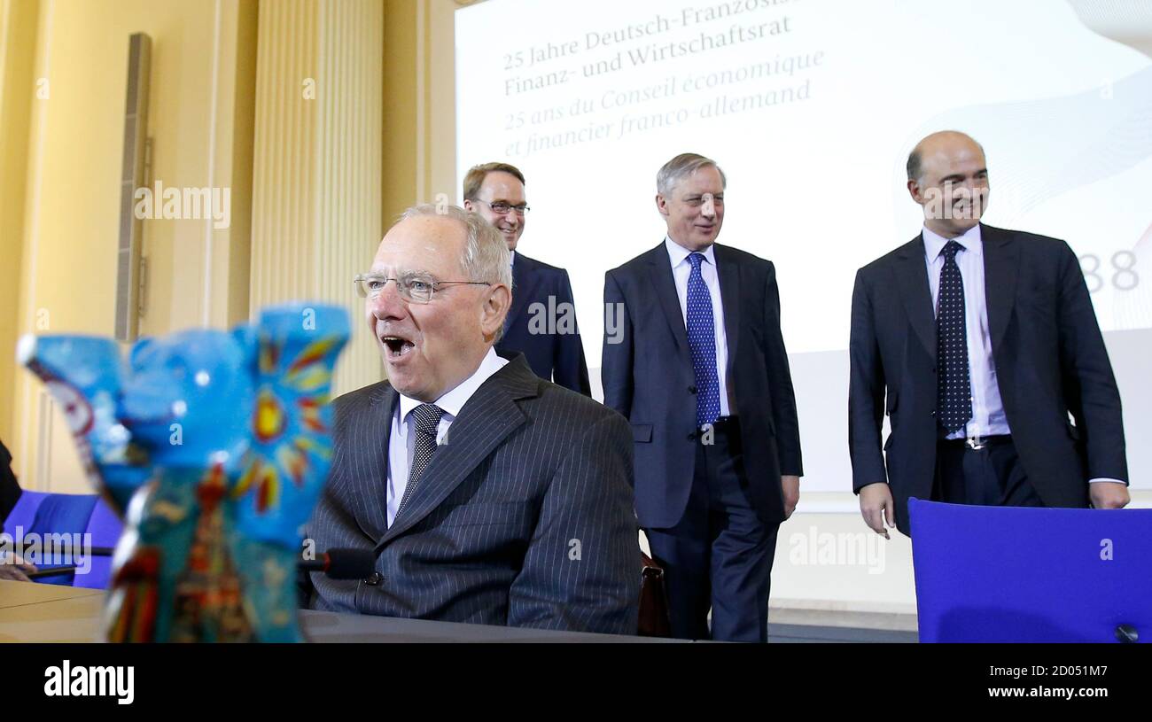 Germany S Finance Minister Wolfgang Schaeuble L R German Central Bank Bundesbank President Jens Weidmann France S Finance Minister Pierre Moscovici And Bank Of France Governor Christian Noyer Arrive For A News Conference After A