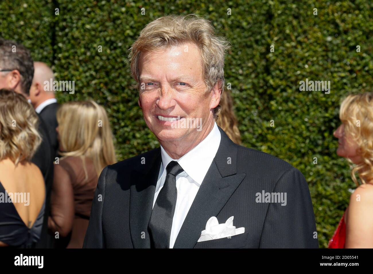 Producer Nigel Lythgoe poses at the 2014 Creative Arts Emmy Awards in Los Angeles, California August 16, 2014.  REUTERS/Danny Moloshok  (UNITED STATES-  Tags: ENTERTAINMENT) Stock Photo