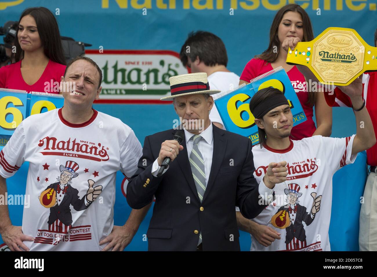 Matt Stonie (R) crowned winner of the annual Fourth July 2015 Nathan's Famous Hot Dog Eating Contest in Brooklyn, New York July 4, 2015. Stonie defeated 8 time champion Joey