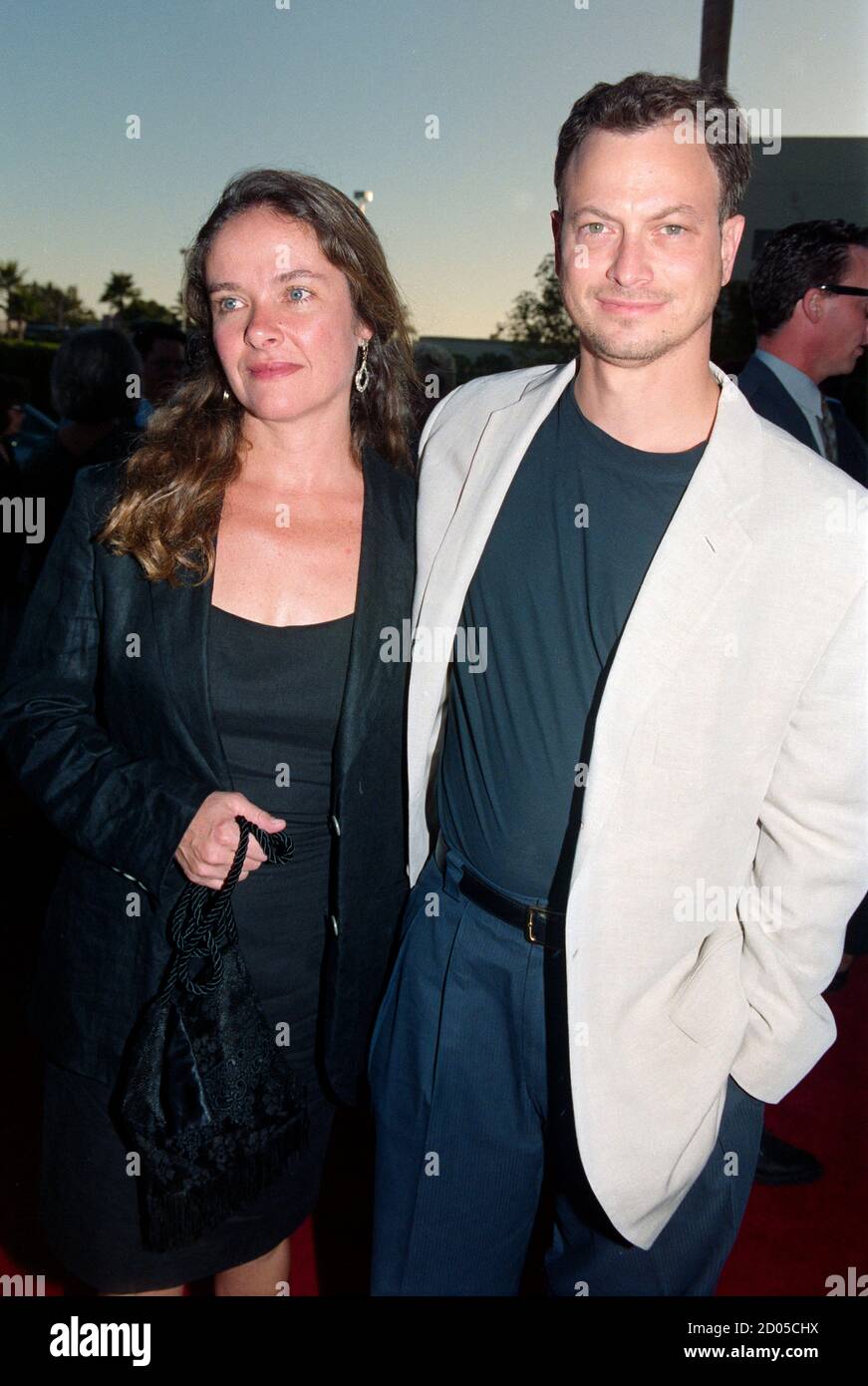ARCHIVE: LOS ANGELES, CA. August 3, 1994:  Actor Gary Sinise & wife Moira Harris at the premiere of 'A Clear And Present Danger'. File photo © Paul Smith/Featureflash Stock Photo